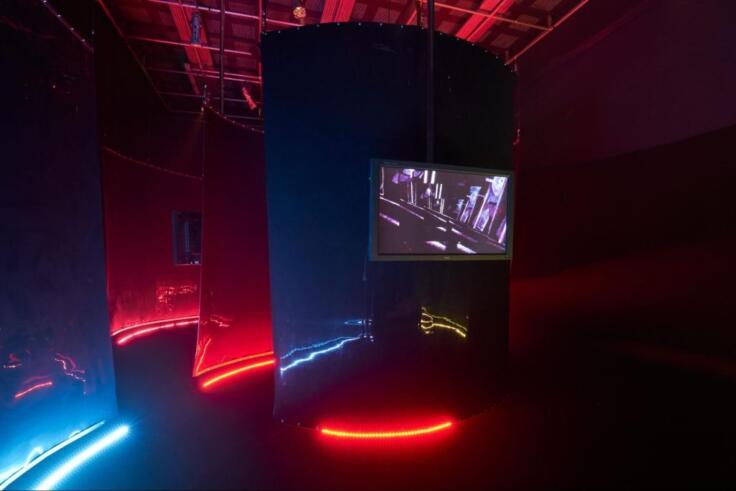 An immersive environment created as an expansion of their short film, Collective Hum (2019). The installation reflects and describes ways in which marginalised groups have developed methods of assembling against a background of repression and discrimination in the UK. B.O.S.S. position Soundsystem culture as a space of communal strength and encounter, where kinship is formed and reciprocated. The audio-visual installation envelops the viewer, resonating through the body, creating a club-like space of collective pleasure and healing. Presented at The Herbert Gallery and Museum (Coventry, 2021) and FACT (Liverpool, 2021).