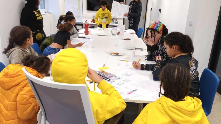 Young people sat around a boardroom table at the first Youth Advisory Board session, Anti Racist Cumbria