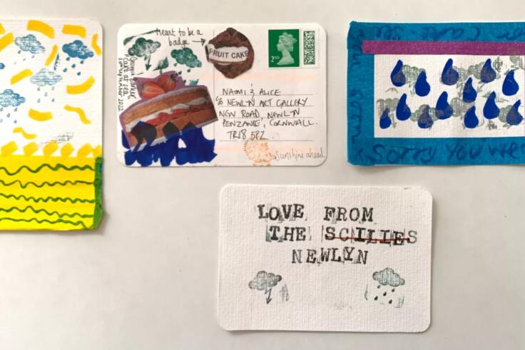 Four postcards featuring painted images of weather. One is addressed to Newlyn Art Gallery.